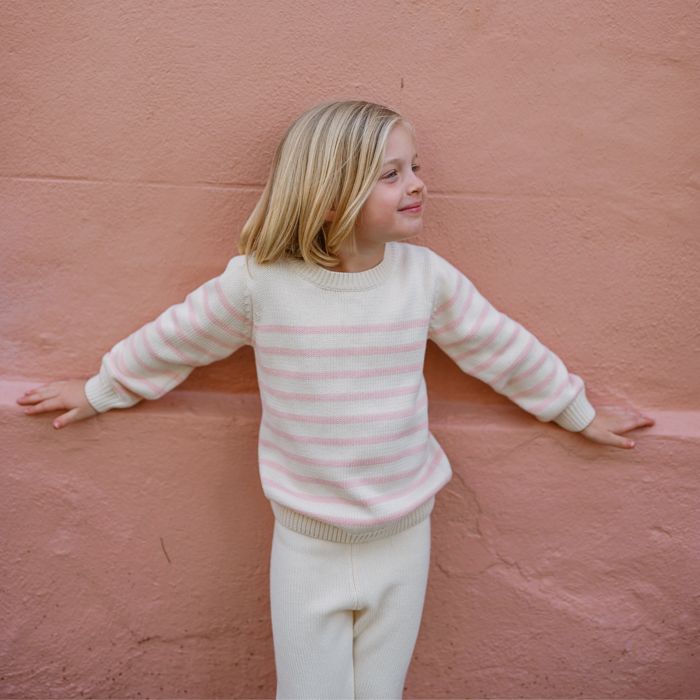 unisex cream and pink stripe knit sweater