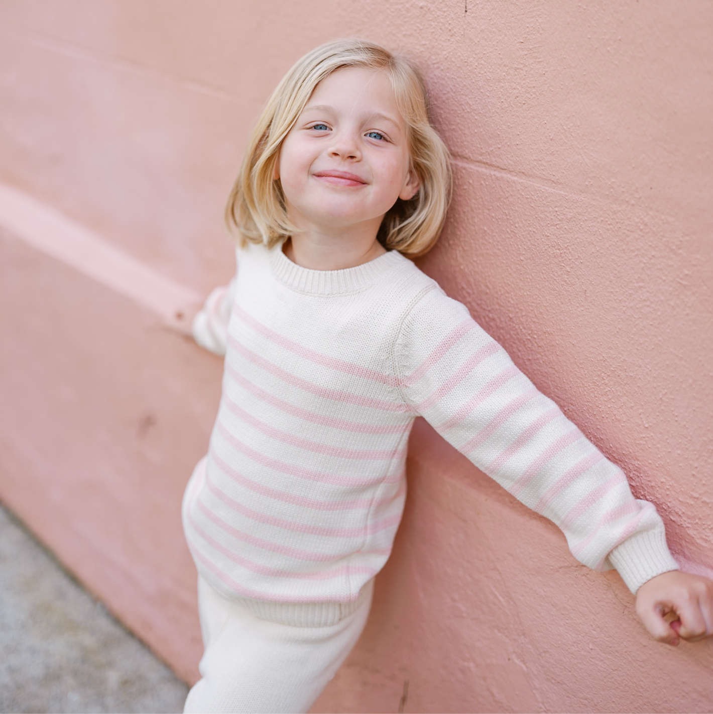 unisex cream and pink stripe knit sweater