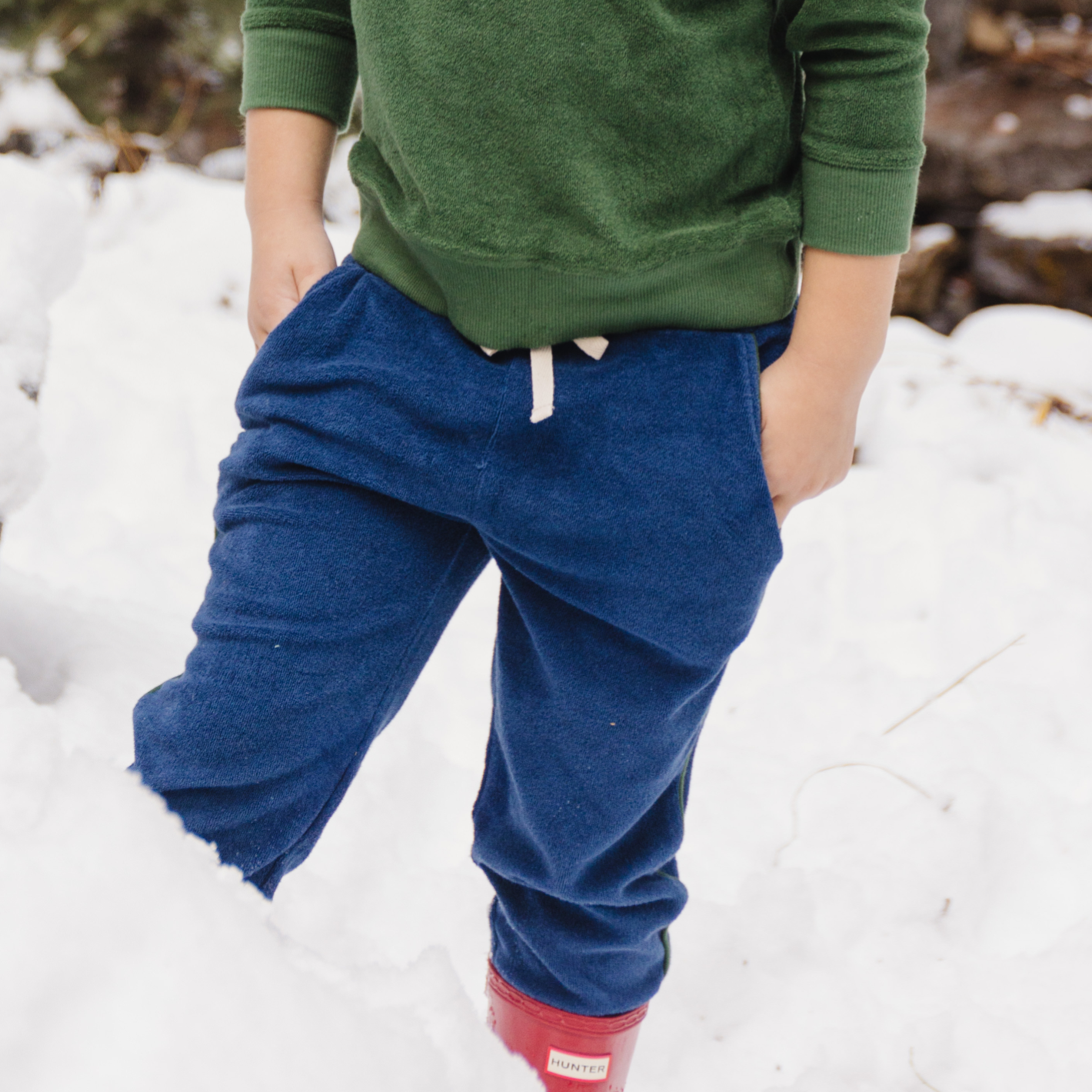 unisex navy french terry sweatpant with evergreen side piping