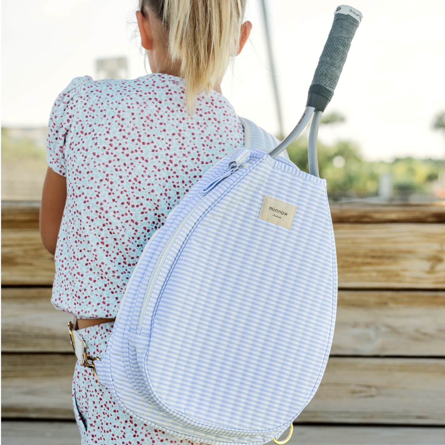 powder blue stripe coated tennis bag