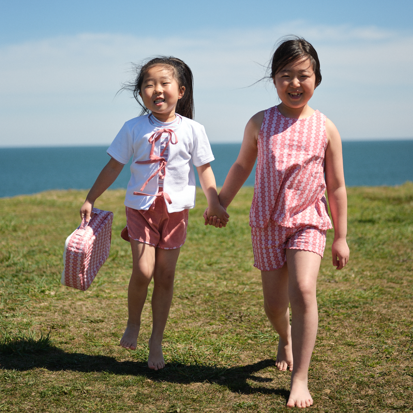 girls white and east end red french terry coverup top