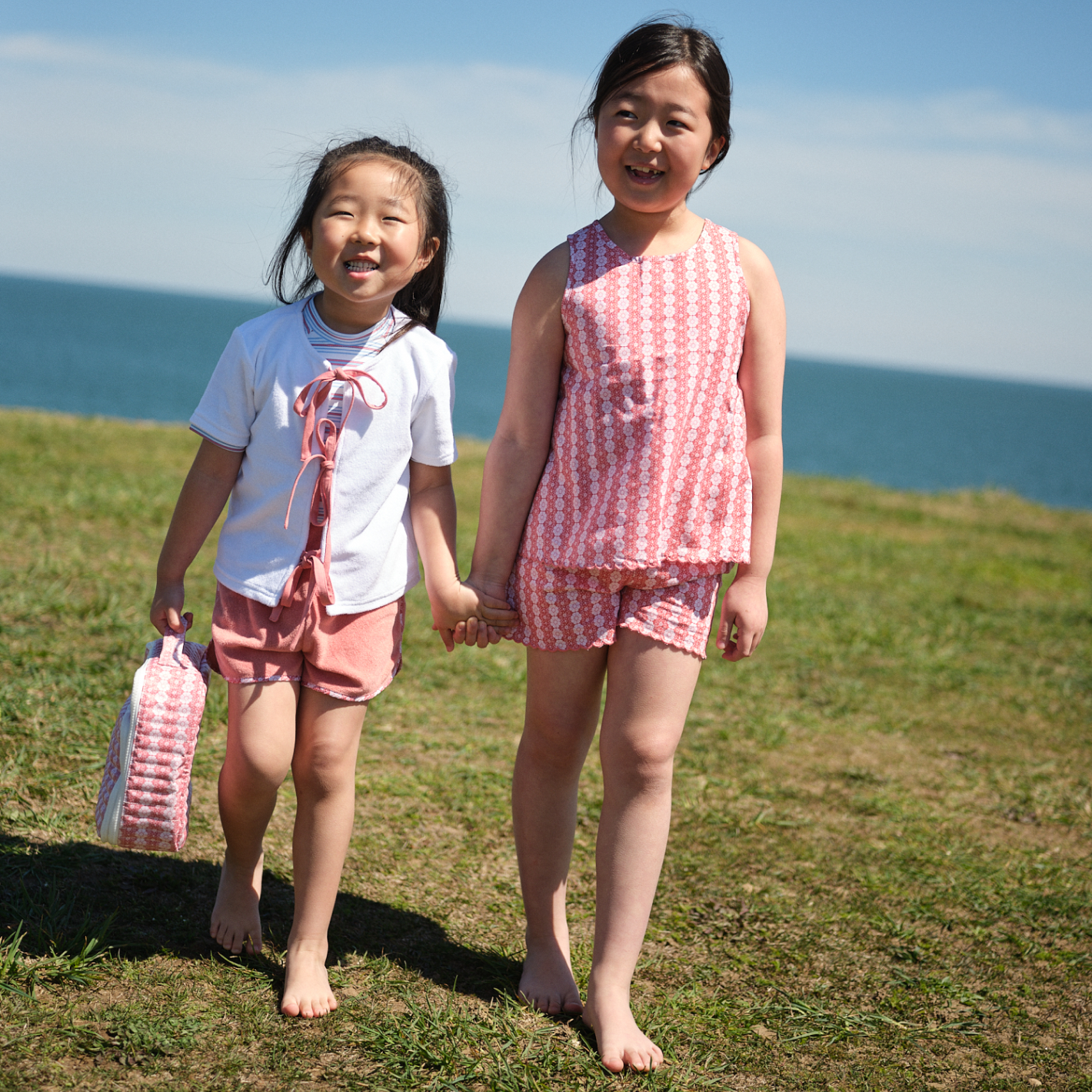 girls white and east end red french terry coverup top